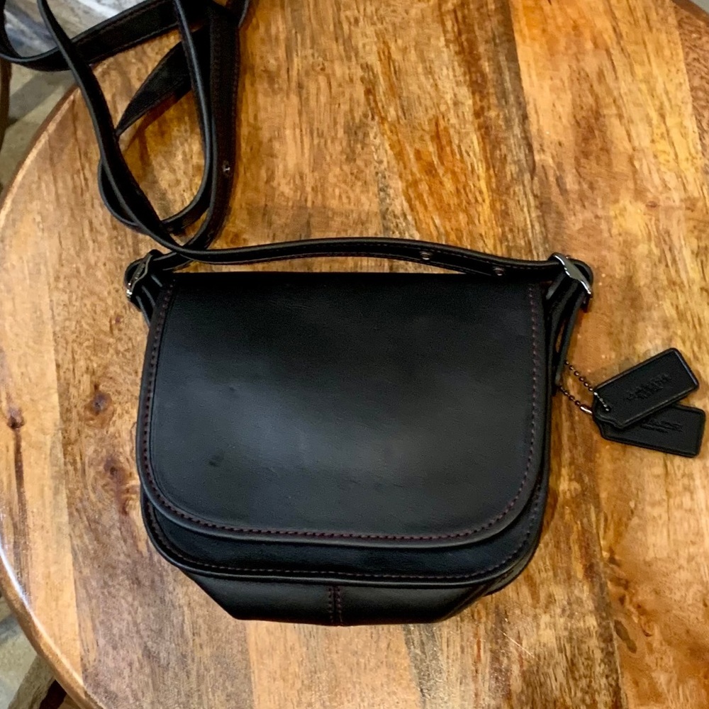 Coach leather black with red stitching details